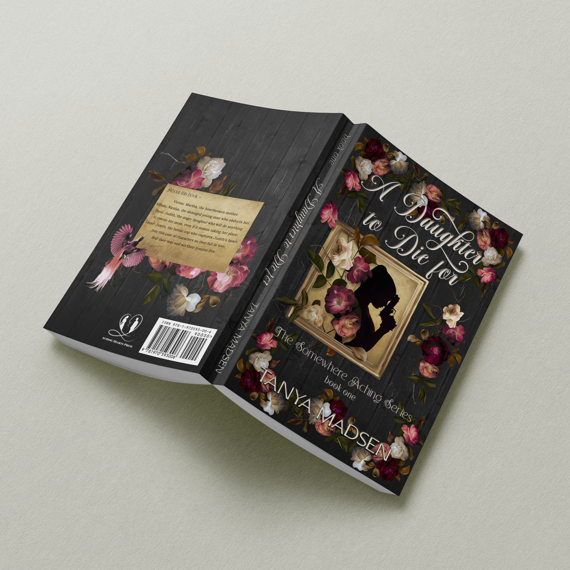 A flat‑lay image of the back cover of A Daughter to Die For, featuring a floral design surrounding a silhouette of a daughter praying while holding a gun. The book rests on a sage‑green background, showing the full back cover and spine.