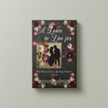 A front‑facing image of the book A Lover to Live For, surrounded by a floral design. The cover shows a silhouette of a couple almost kissing, the sun peaking between them. The book is set against a sage‑green background.
