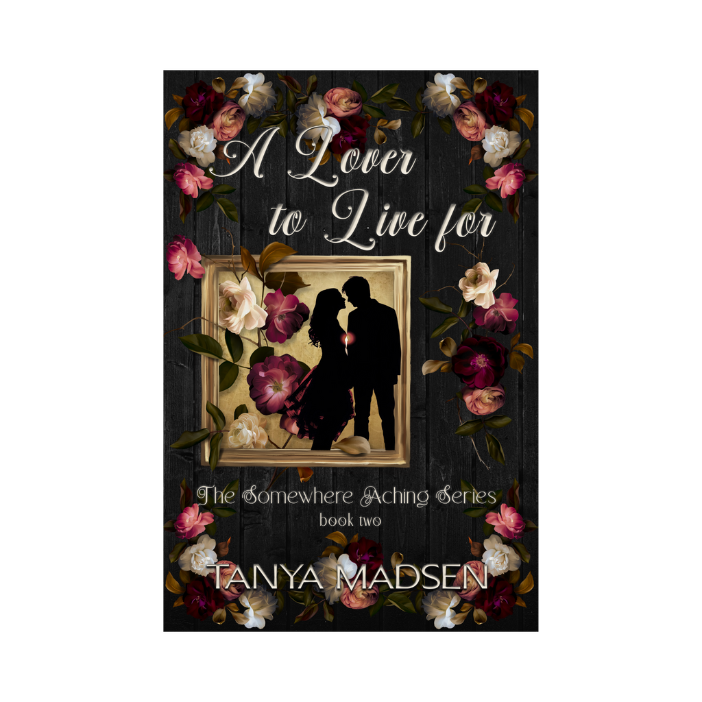 A front‑facing image of the book A Lover to Live For, surrounded by a floral design. The cover shows a silhouette of a couple almost kissing, the sun peaking between them.