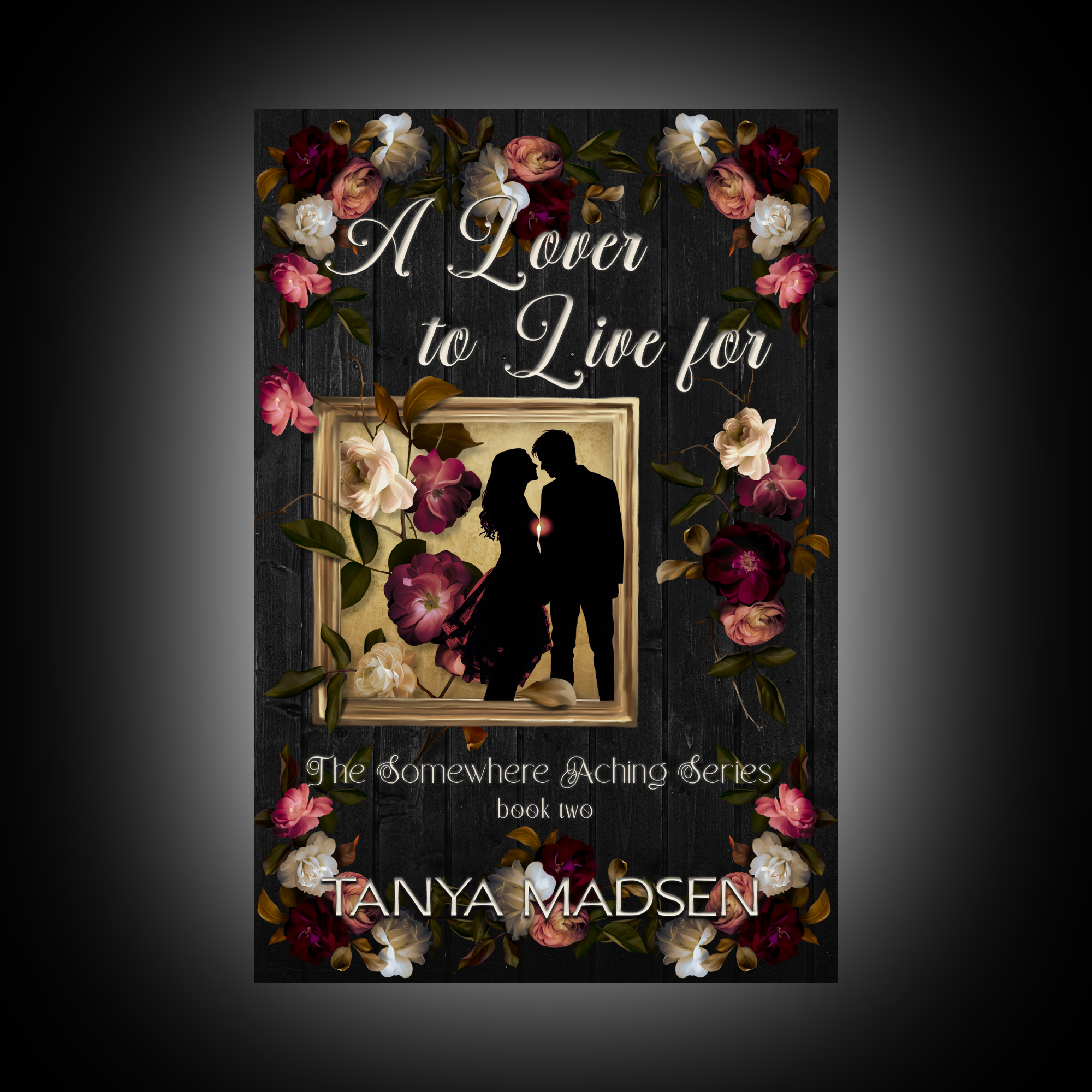 Book cover of 'A Lover to Live for' by Tanya Madsen with floral design and silhouette of a couple.