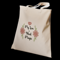 A canvas tote illustrated with the quote: “My Love is Black Magic” in boho script, paired with a heart and flowers.