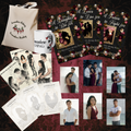 Collection of merchandise including a tote bag, mug, character art, books 1-3, ilustrative art, and annotation cards with romantic imagery on a dark background.
