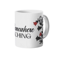 White mug with red belladonna floral design and text on a white background.