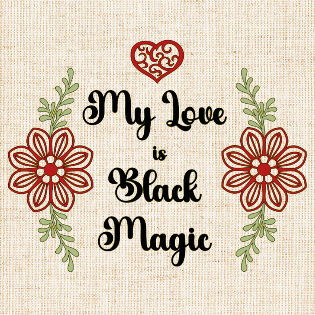 A close-up of canvas tote illustrated with the quote: “My Love is Black Magic” in boho script, paired with a heart and flowers