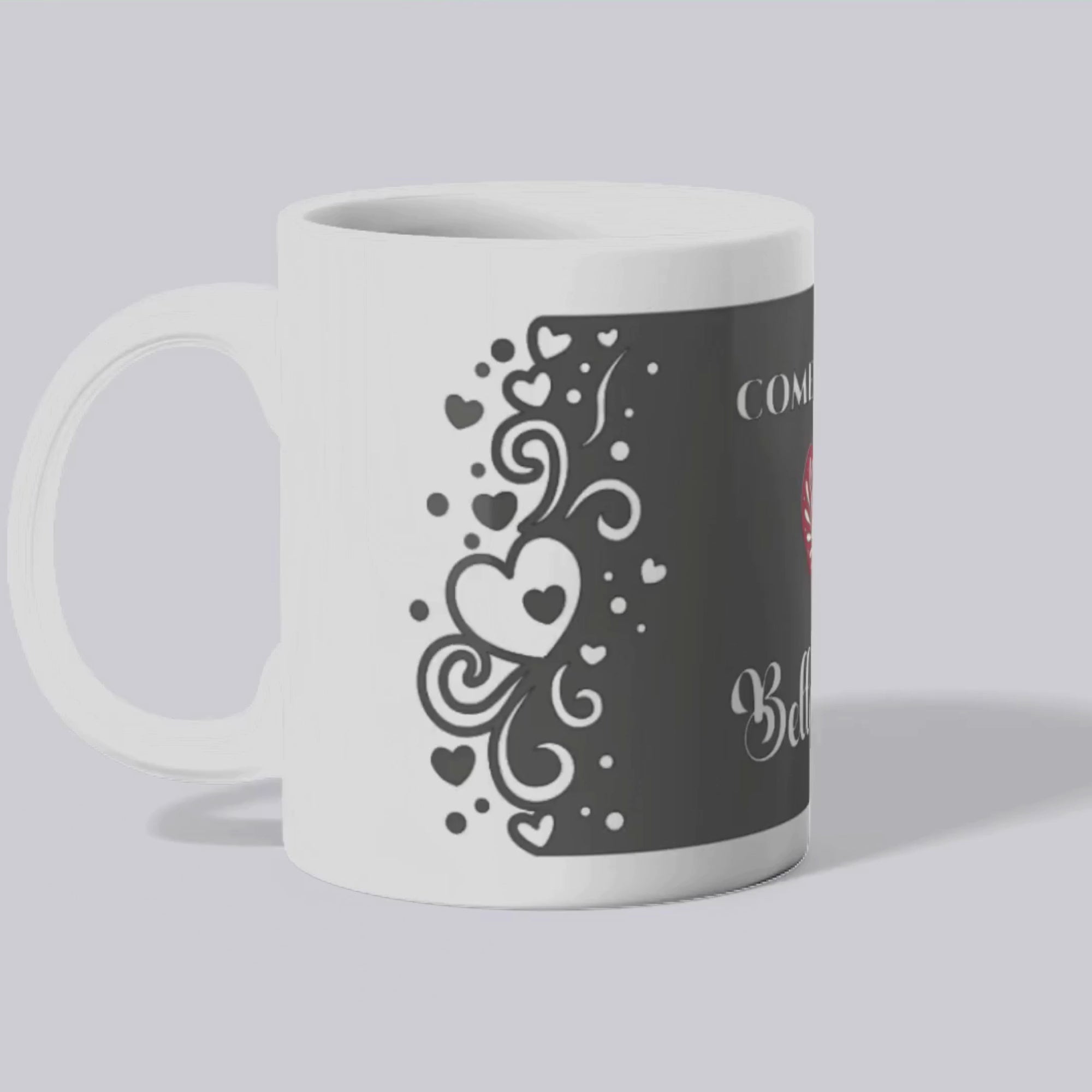 A mockup of the Belladonna mug featuring a black mug with a red heart, text 'Come with me Belladonna', and black border with white hearts and swirls.