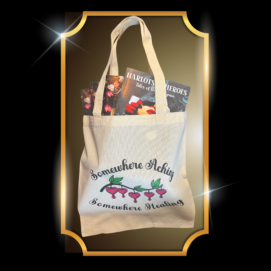 A video of canvas tote illustrated with the quote “Somewhere Aching, Somewhere Healing” paired with a cluster of bleeding hearts.